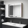 VidaXL Badkamerkast met spiegel en LED 80x12x68 cm wit en eikenkleurig online kopen
